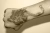 chinese tattoo dragon on hand
